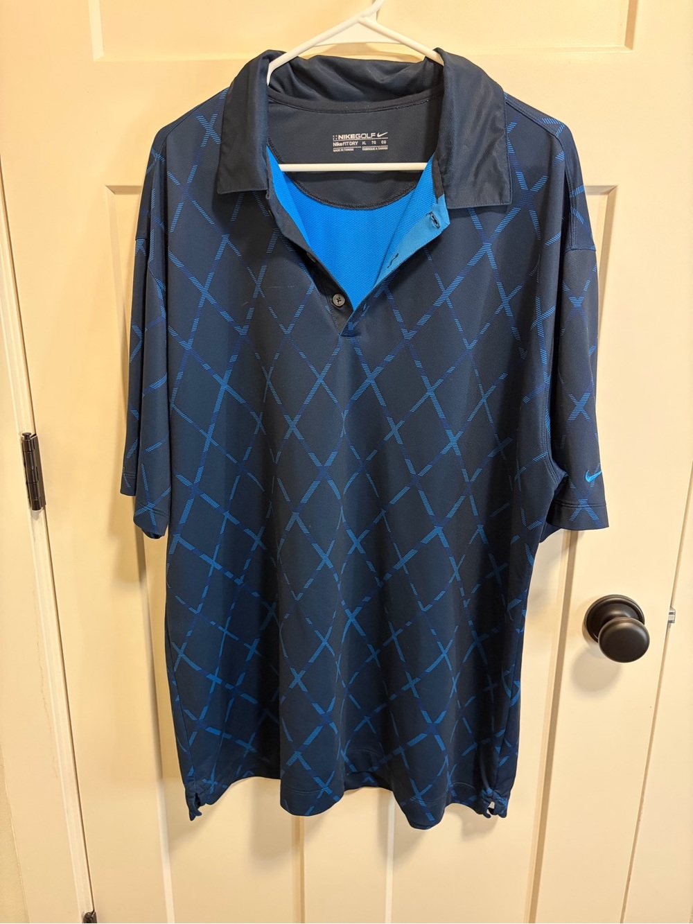 Nike Men’s Navy Polo with Bright Blue Geometric Pattern